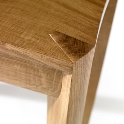 Detail on leg joint on the Redgr series of furniture